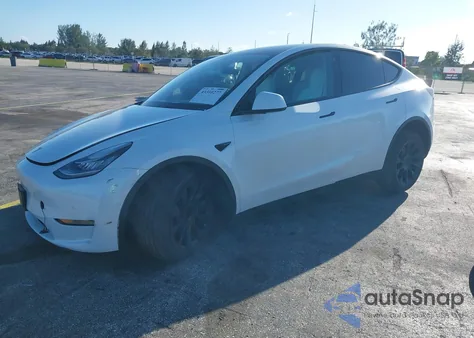 2022 Tesla Model Y из США, поврежденный, VIN 7SAYGAEEXNF468922